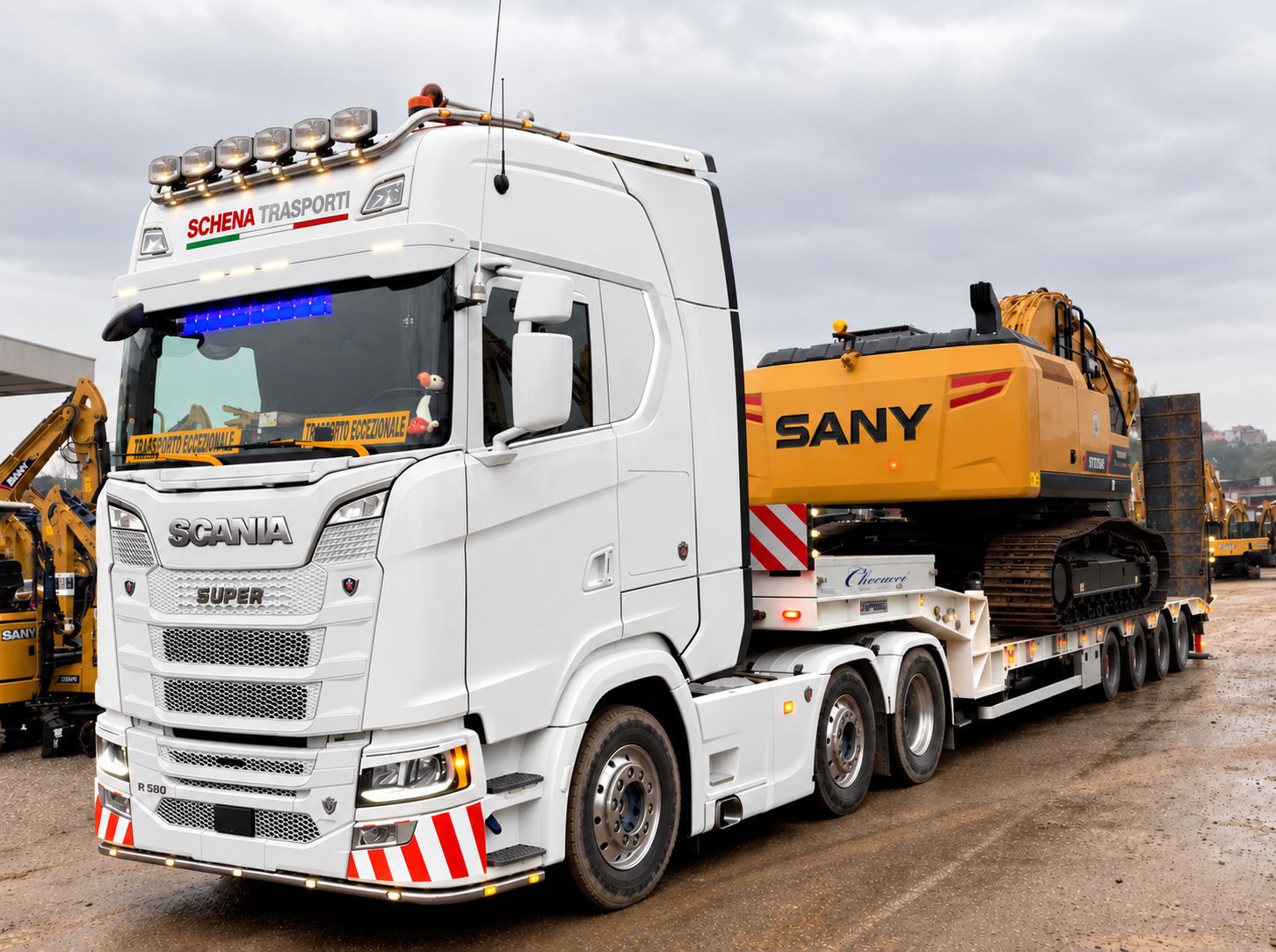 Camion Schena Trasporti con segnaletica Trasporto Eccezionale e scavatore Sany su carrellone